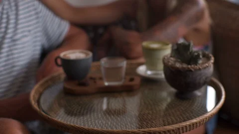 Waiter's hands put on the table with coffee Pumpkin vegetable pie Stock Footage 101649572