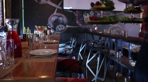 Waiters laying the table in a restaurant Stock Footage 64973193