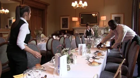 Waiters prepare the table Stock Footage 55101692