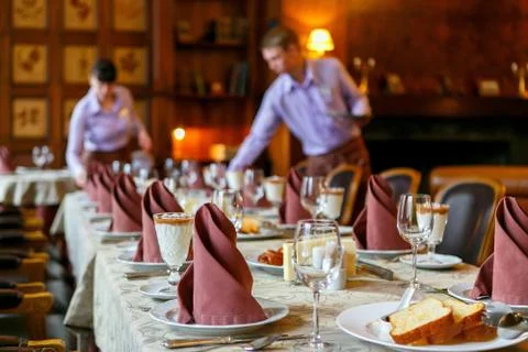 Waiters serve the table Stock Photos