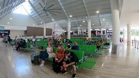 Waiting area in the terminal in Punta Cana International Airport Dominican Re Stock Footage 88112486