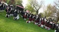Waiting bagpipe players diagonale at Highland Gathering HD Footage