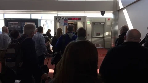Waiting to board at gate Stock Footage 74504362