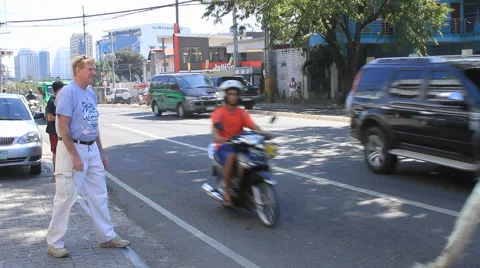 Waiting for a cab in the Philippines Stock Footage 43794047