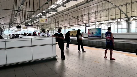 Waiting Commuters in the Platform of LRT Line 2 Antipolo Station Stock Footage 234371154
