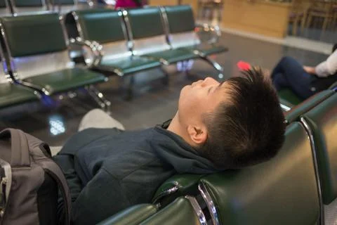 Waiting for flight delay is always a terrible memory Stockfoto's