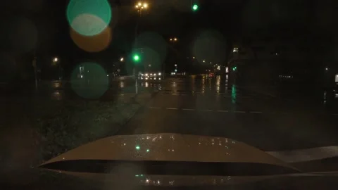 Waiting for the green light of an traffic light and then starting to drive Stock Footage 139032149