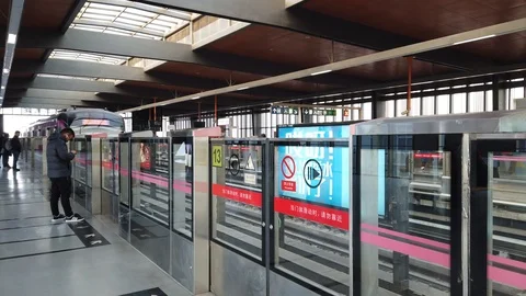 Waiting for MRT subway train on platform until train arrived and enter the train Stock Footage 123093388
