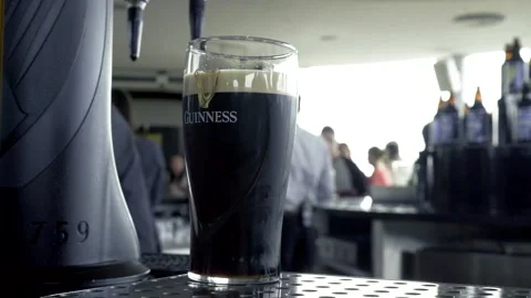Waiting on a pint of Guinness settling Stock Footage 133245143