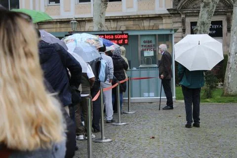 Waiting in a queue Stock Photos