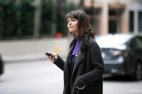Waiting for a Rideshare or Checking Mobile Phone for GPS Navigation Stock Photos