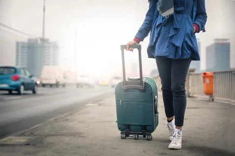 Waiting with a suitcase Stock Photos