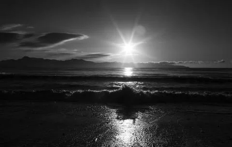 Waiting for sunset and capturing wave shadows Stock Photos