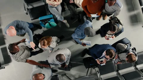 Waiting, top down view and people in airport checking flight schedule Stock Footage 333651039