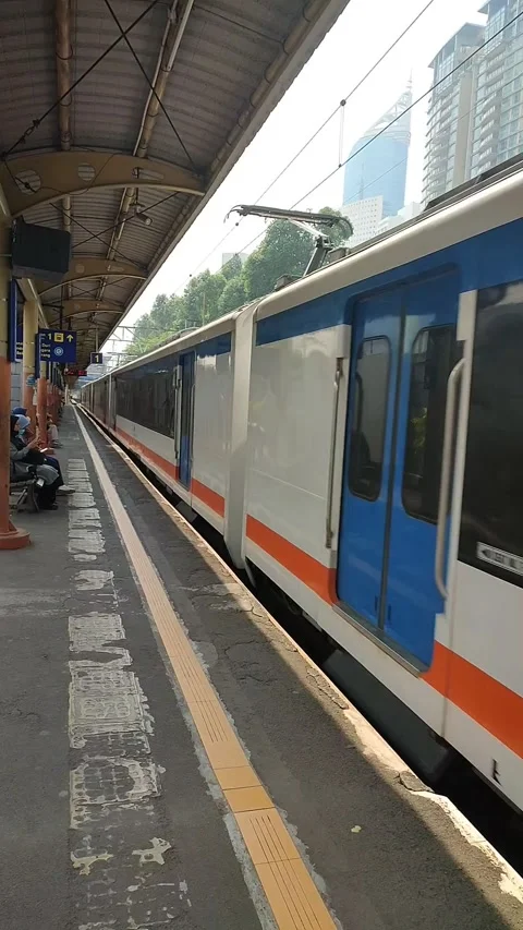 Waiting for  The Train To Pass At Karet Station Jakarta Stock Footage 290094962
