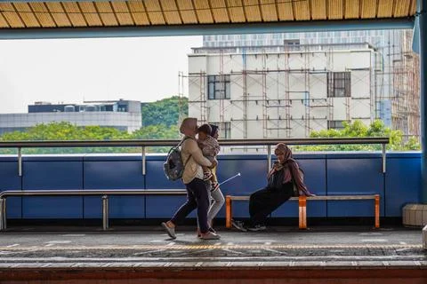 Waiting at the train station Stock Photos