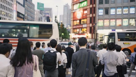 Waiting for Walk through the crowded pedestrian crossing in the rush hour Stock Footage 126710103
