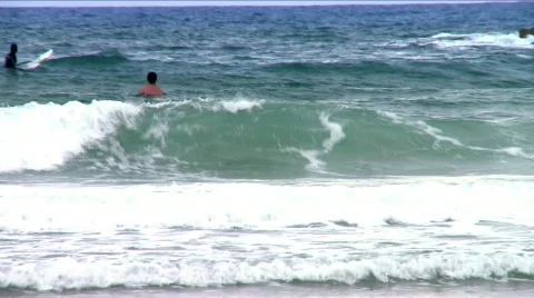 Waiting for the waves - surfers 2 Stock Footage 693498