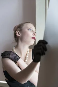 Waiting by the window Stock Photos