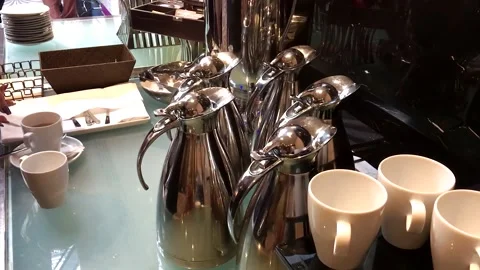 Waitr pouring hot drink during coffee break, closeup Stockbeeldmateriaal 240005358