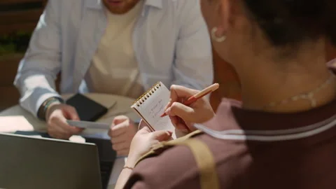Waitress Accepting Order from Male Freelancer Working in Cafe Stock Footage 317294685