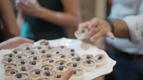 Waitress with Blueberry Pastries Stock Footage 254366126