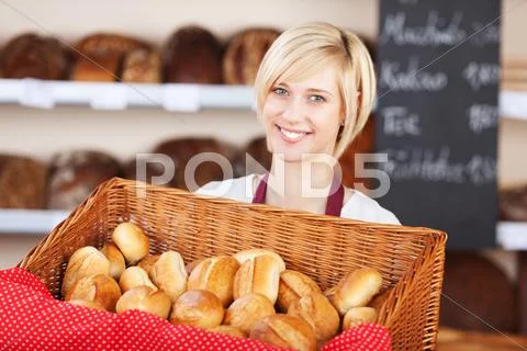 Waitress with bread basket in cafe Stock Photos