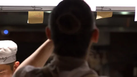 Waitress checking dockets Stock Footage 86931002