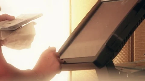 Waitress making order for the kitchen using touchscreen computer or POS system Stock Footage 77300679