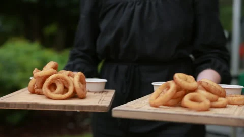Waitress with Onion Rings Stock Footage 254366606
