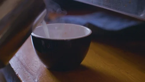 Waitress pouring coffee in cup Stock Footage 87805981