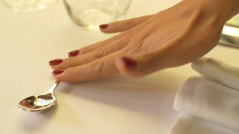 A waitress put a small spoon on the table Stock Footage 71467014
