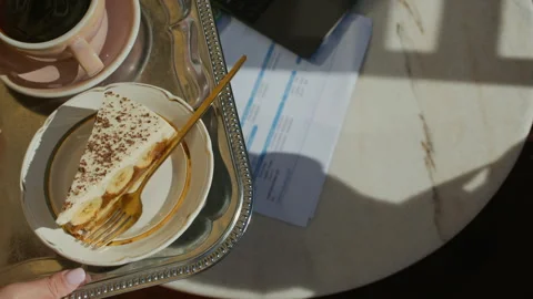 Waitress Serving Coffee and Cake to Client Working at Table in Cafe Stock Footage 317292129