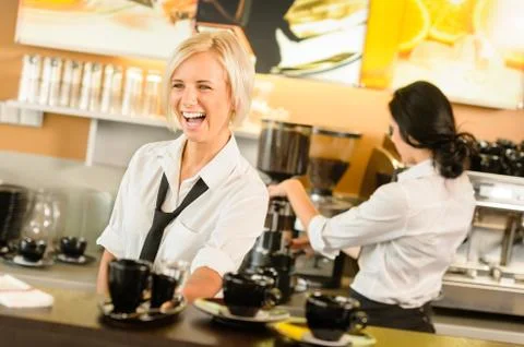 Waitress serving coffee cups making espresso woman Stock Photos