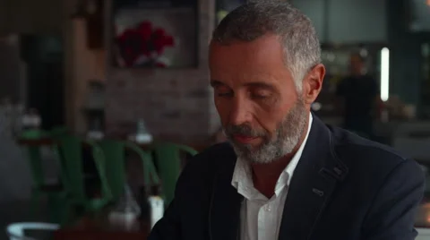 Waitress serving coffee to customer at cafe. Stock Footage 64093724