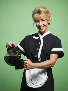 Waitress serving coffee Foto stock