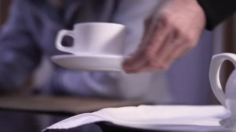 Waitress serving cup close up of hand Stock Footage 68379927