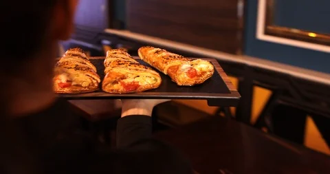 The Waitress serving a dinner in restaurant Stock Footage 118901265