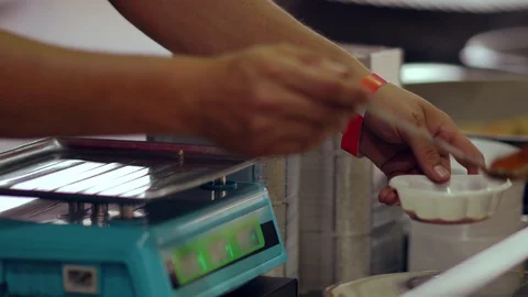 Waitress serving sauce in a side dish Video stock 115076873