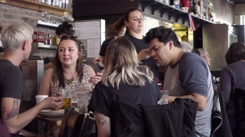 Waitress serving working people eating restaurant East Village Manhattan NYC 4K Stock Footage 80969094