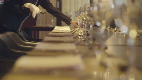 Waitress setting table for banquet Stock Footage 75192919