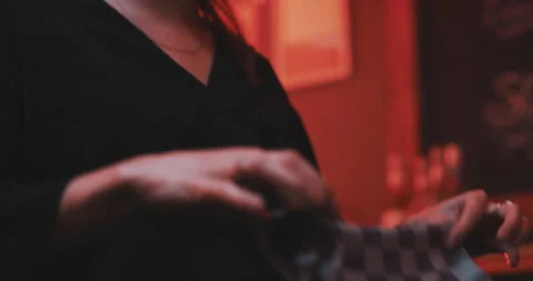 Waitress smiling and folding her cloth Stock Footage 203583472