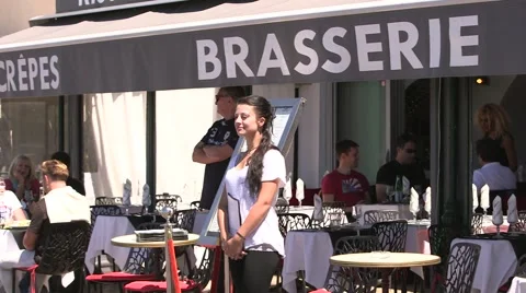WAITRESS ST TROPEZ CAFE Stock Footage 45696740