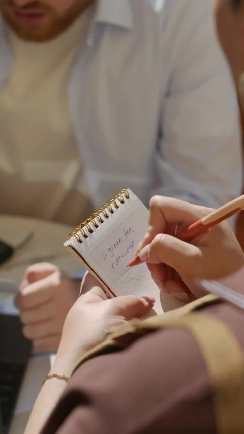 Waitress Taking Notes Accepting Order of Client Working at Cafe Table Stock Footage 317290288