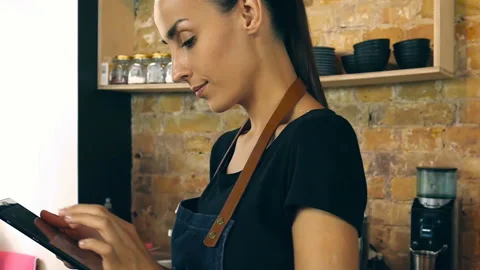 Waitress  taking order and working with digital tablet. Stock Footage 94337477
