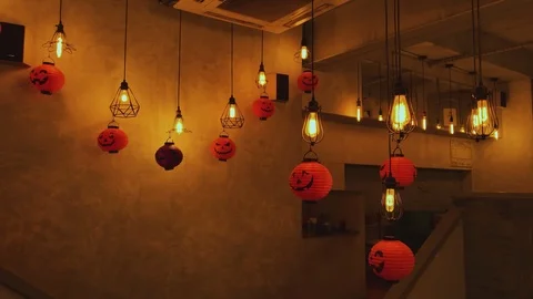 Waitresses in the bar communicate decorated in the style of Halloween Stock Footage 117736502