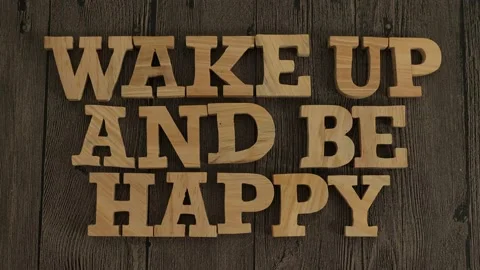 Wake up and be happy, text words typography written with wooden letter, lif.. Video stock 235301056