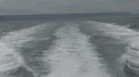 Wake behind fast boat Stock Footage 1060310
