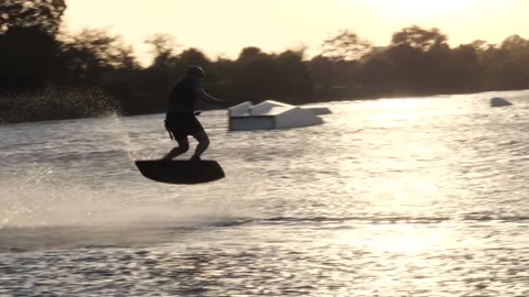 Wake Boarder Doing Half-Somersault Stock Footage 200845143