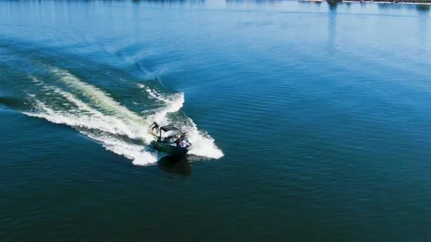 Wake Boarder- Performing a 360 Stock Footage 141079971